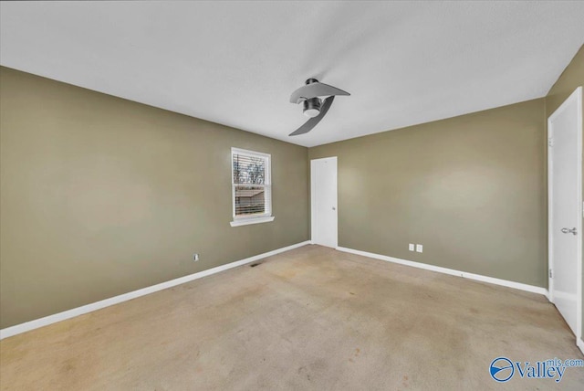 interior space with baseboards and carpet floors