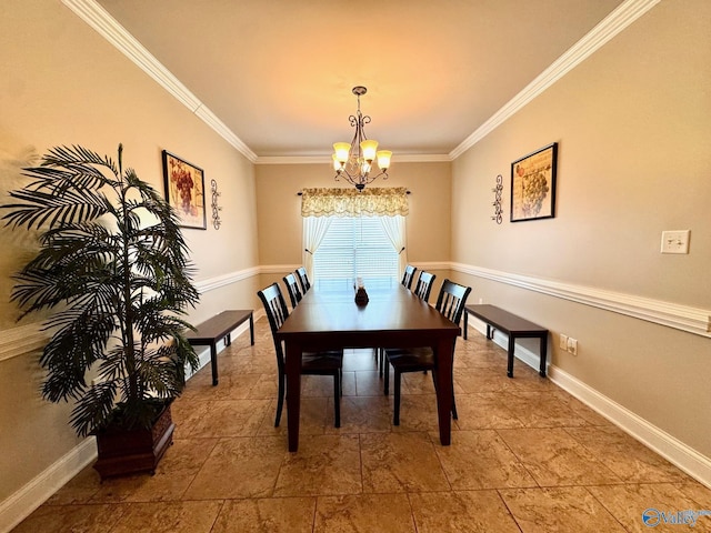 dining space with ornamental molding and a notable chandelier