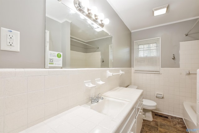 full bathroom featuring tile walls, crown molding, shower / bathing tub combination, vanity, and toilet