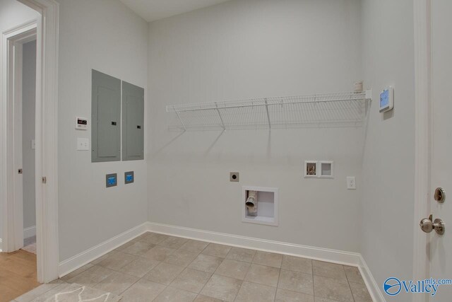 laundry room featuring electric dryer hookup, hookup for a washing machine, and electric panel