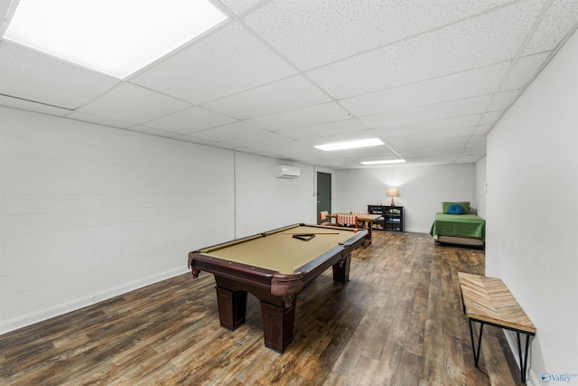 playroom featuring billiards, dark hardwood / wood-style flooring, and a paneled ceiling