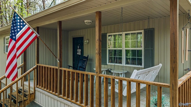 property entrance featuring covered porch