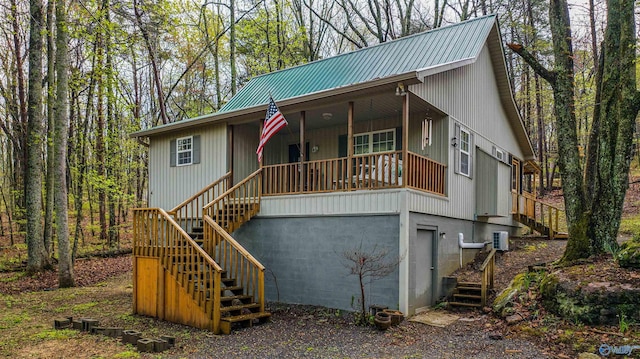 view of front of house featuring central air condition unit