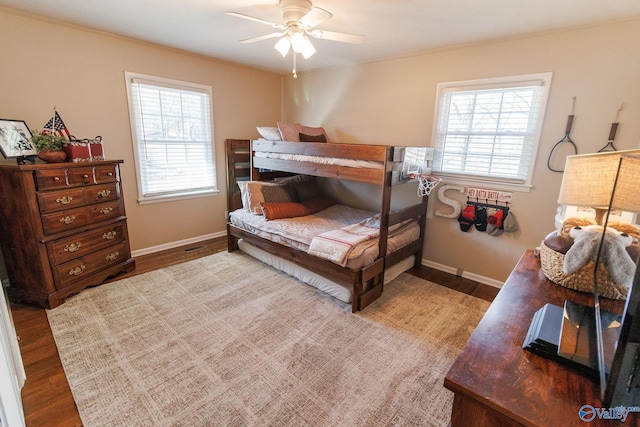 bedroom featuring ceiling fan and hardwood / wood-style floors