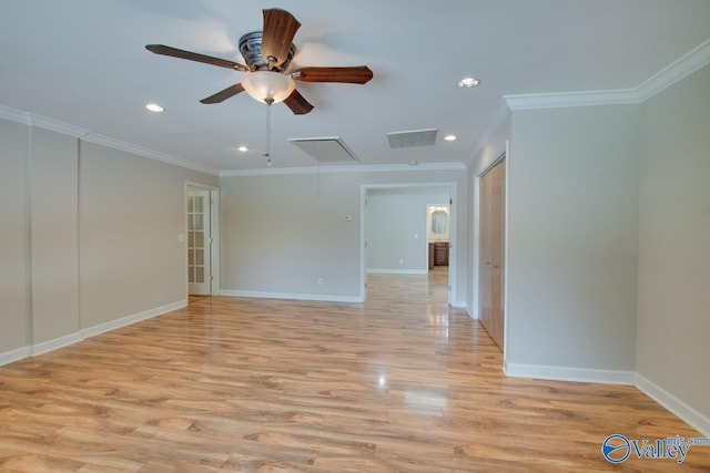spare room featuring attic access, a ceiling fan, light wood-style floors, recessed lighting, and baseboards