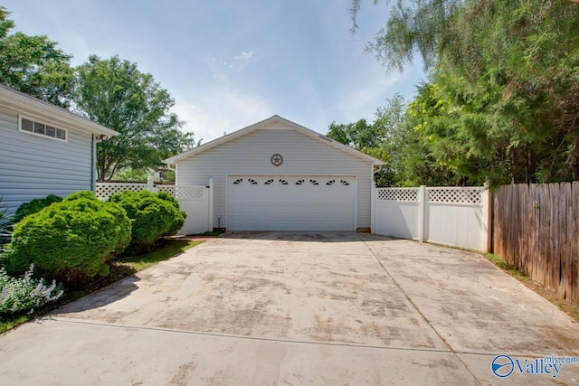 detached garage with fence