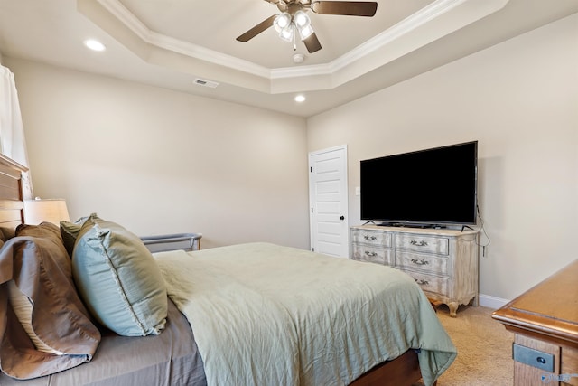 bedroom with crown molding, visible vents, a raised ceiling, light carpet, and recessed lighting