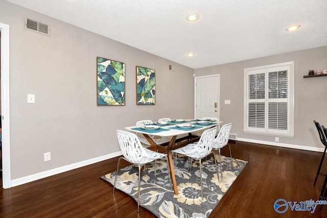 dining area with recessed lighting, visible vents, baseboards, and wood finished floors