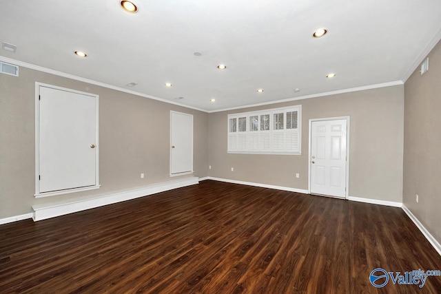 unfurnished room featuring ornamental molding, recessed lighting, baseboards, and wood finished floors