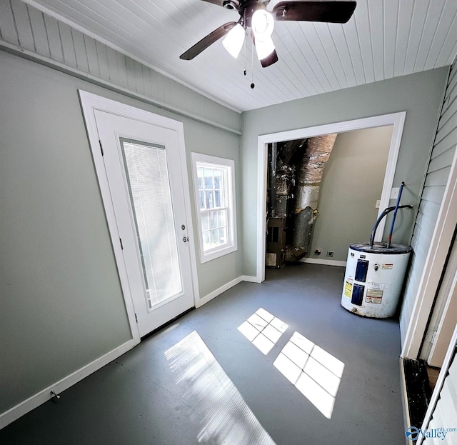 entryway with water heater, baseboards, and a ceiling fan