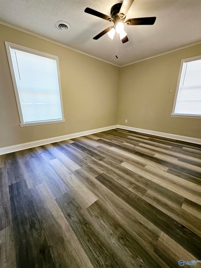 empty room with crown molding, wood-type flooring, a textured ceiling, and ceiling fan