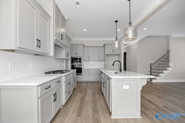 111 Mayapple Trl, Madison, AL 35756 - kitchen with a sink, appliances with stainless steel finishes, decorative backsplash, and recessed lighting
