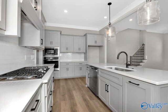 111 Mayapple Trl, Madison, AL 35756 - kitchen with recessed lighting, a sink, appliances with stainless steel finishes, and tasteful backsplash
