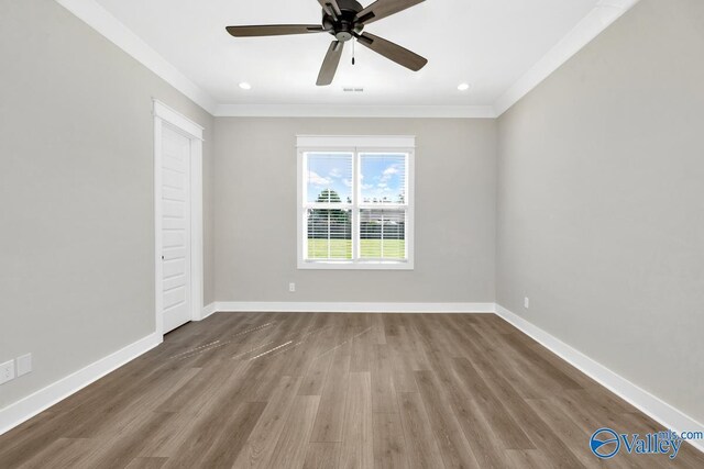 111 Mayapple Trl, Madison, AL 35756 - empty room with baseboards, ornamental molding, and wood finished floors