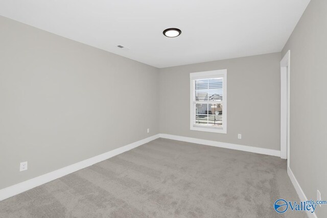 111 Mayapple Trl, Madison, AL 35756 - carpeted empty room featuring baseboards and visible vents