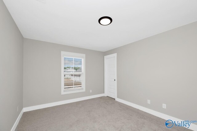 111 Mayapple Trl, Madison, AL 35756 - unfurnished room with carpet floors and baseboards