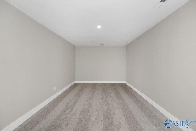 111 Mayapple Trl, Madison, AL 35756 - spare room with baseboards, carpet flooring, recessed lighting, and visible vents