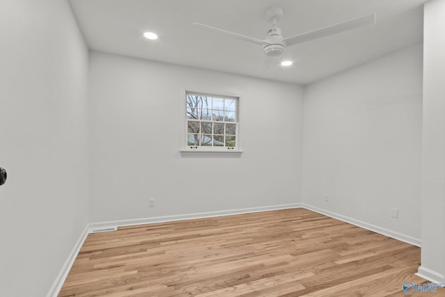 unfurnished room featuring light hardwood / wood-style floors and ceiling fan