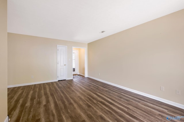 104 Sycamore Pl, Athens, AL 35611 - empty room with baseboards and dark wood-style flooring