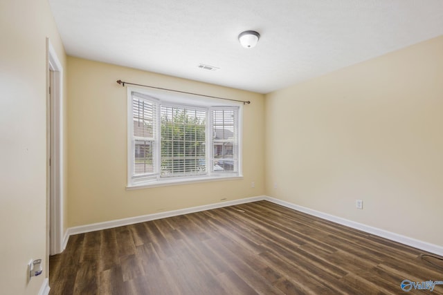 104 Sycamore Pl, Athens, AL 35611 - empty room with dark wood finished floors and baseboards