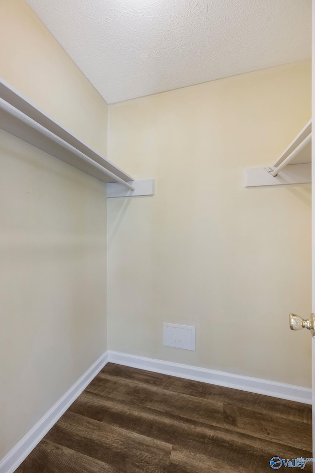 104 Sycamore Pl, Athens, AL 35611 - walk in closet with dark wood finished floors