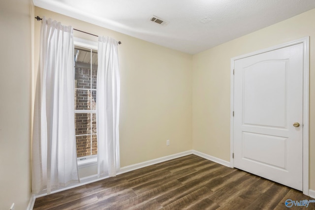 104 Sycamore Pl, Athens, AL 35611 - spare room with dark wood-style floors and baseboards