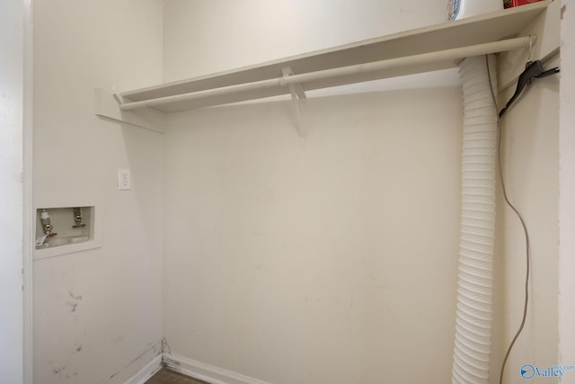 104 Sycamore Pl, Athens, AL 35611 - laundry room featuring hookup for a washing machine, hookup for an electric dryer, and baseboards