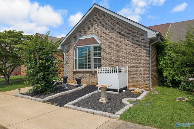 104 Sycamore Pl, Athens, AL 35611 - view of front of house with brick siding and a front yard