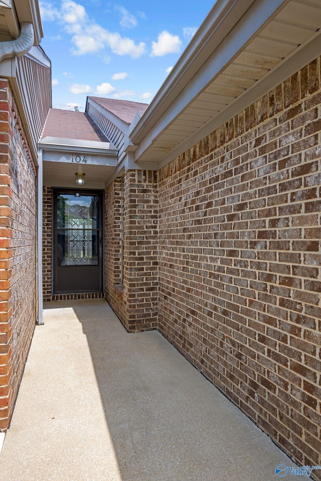 104 Sycamore Pl, Athens, AL 35611 - property entrance with brick siding and a shingled roof