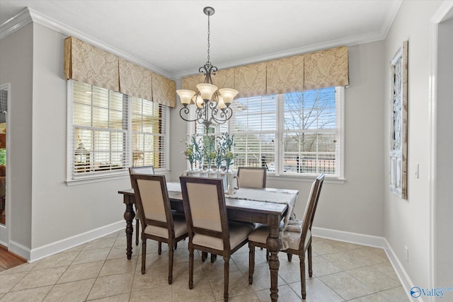 dining space featuring crown molding, light tile patterned floors, and a chandelier