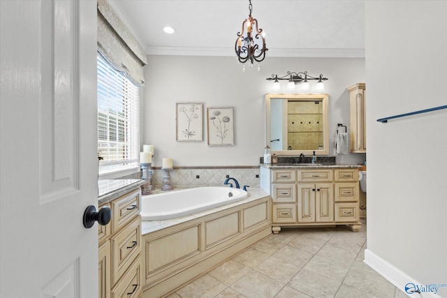 bathroom featuring crown molding, an inviting chandelier, vanity, tile patterned floors, and a bathing tub