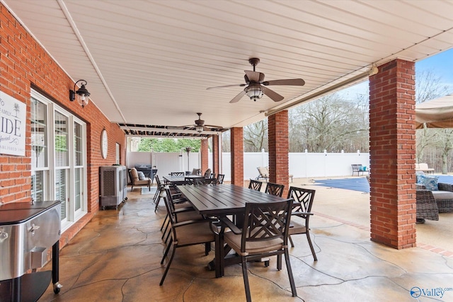 view of patio / terrace featuring ceiling fan