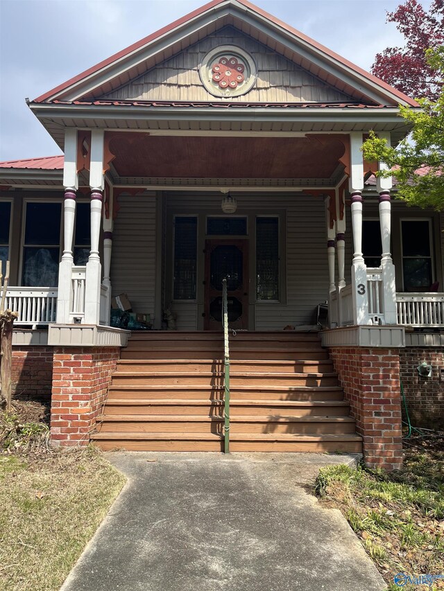 view of front of home featuring covered porch