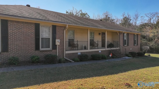 12501 S Shawdee Rd SE, Huntsville, AL 35803 - view of front of house with a porch, a front yard, brick siding, a shingled roof, and crawl space
