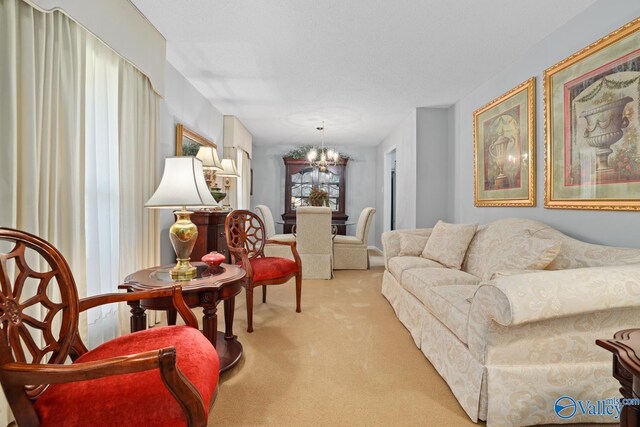 12501 S Shawdee Rd SE, Huntsville, AL 35803 - living area with light colored carpet and a chandelier