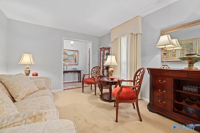 12501 S Shawdee Rd SE, Huntsville, AL 35803 - living room featuring light colored carpet and baseboards