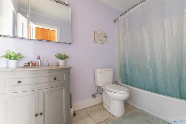 full bath featuring vanity, shower / bathtub combination with curtain, baseboards, tile patterned floors, and toilet