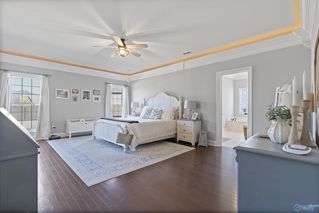 bedroom with multiple windows, ornamental molding, and dark wood-type flooring