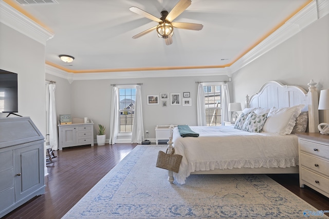 bedroom with multiple windows, ornamental molding, and dark wood-type flooring