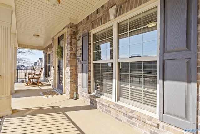 view of patio featuring a porch