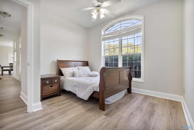 25 County Road 504, Centre, AL 35960 - bedroom featuring light wood finished floors, baseboards, and ceiling fan
