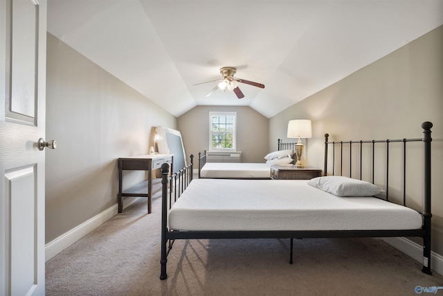25 County Road 504, Centre, AL 35960 - carpeted bedroom with vaulted ceiling, baseboards, and a ceiling fan