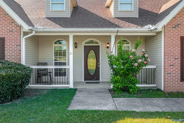 25 County Road 504, Centre, AL 35960 - doorway to property with brick siding, a shingled roof, and covered porch