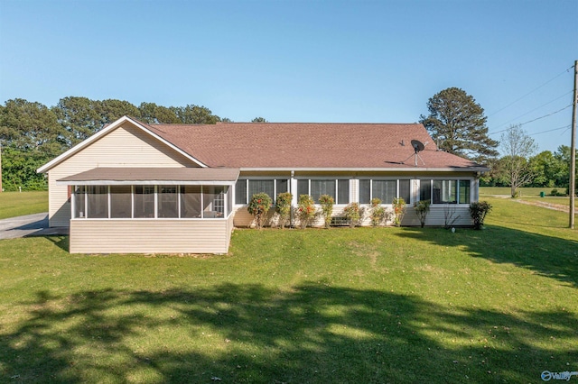 25 County Road 504, Centre, AL 35960 - rear view of property with a shingled roof, a sunroom, and a yard