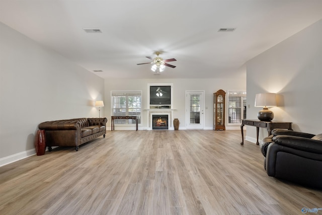 25 County Road 504, Centre, AL 35960 - living room featuring baseboards, light wood-style flooring, visible vents, and ceiling fan