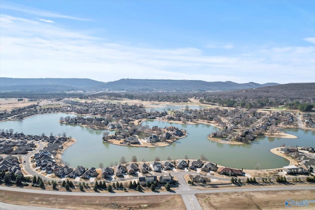 bird's eye view featuring a residential view and a water and mountain view