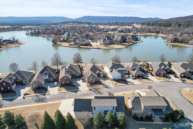 aerial view with a residential view and a water and mountain view