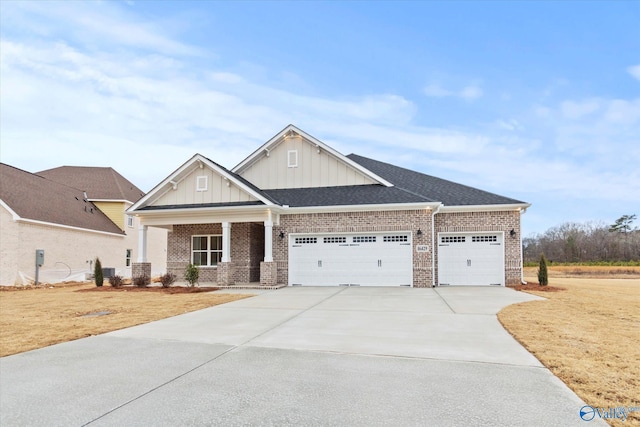 view of front of house with a garage and a front lawn