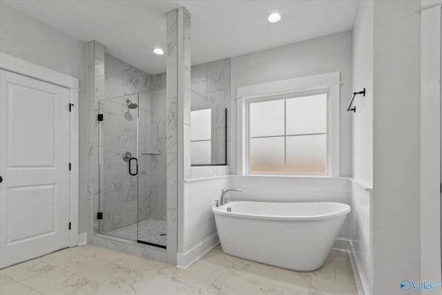 bathroom featuring plus walk in shower