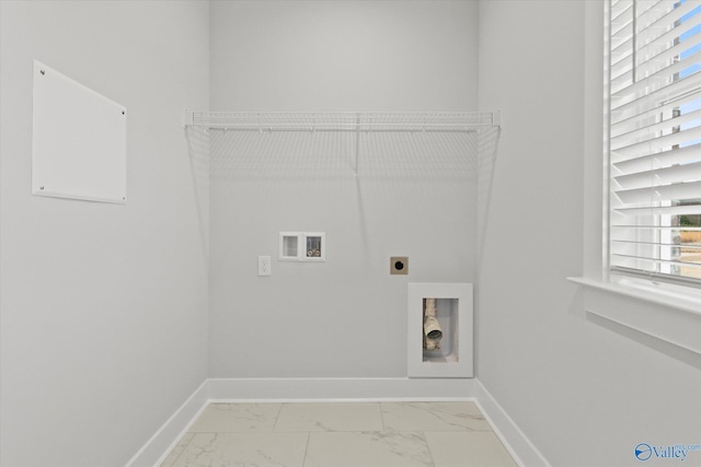 laundry area featuring hookup for an electric dryer and hookup for a washing machine